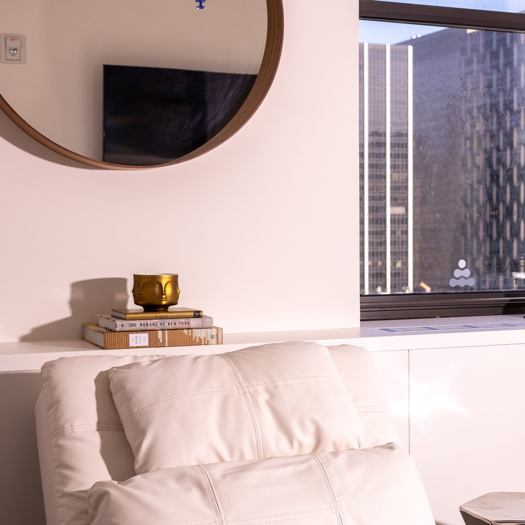 A chair infront of a window