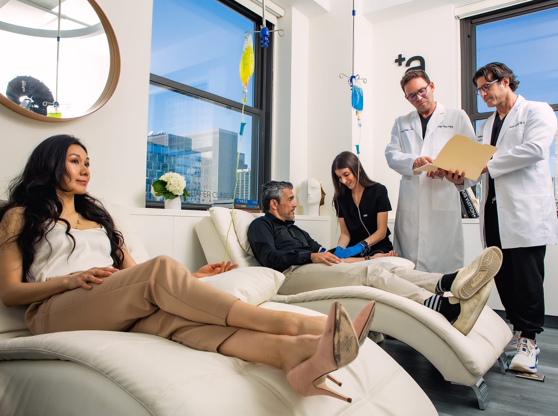 group of people getting iv infusion therapy